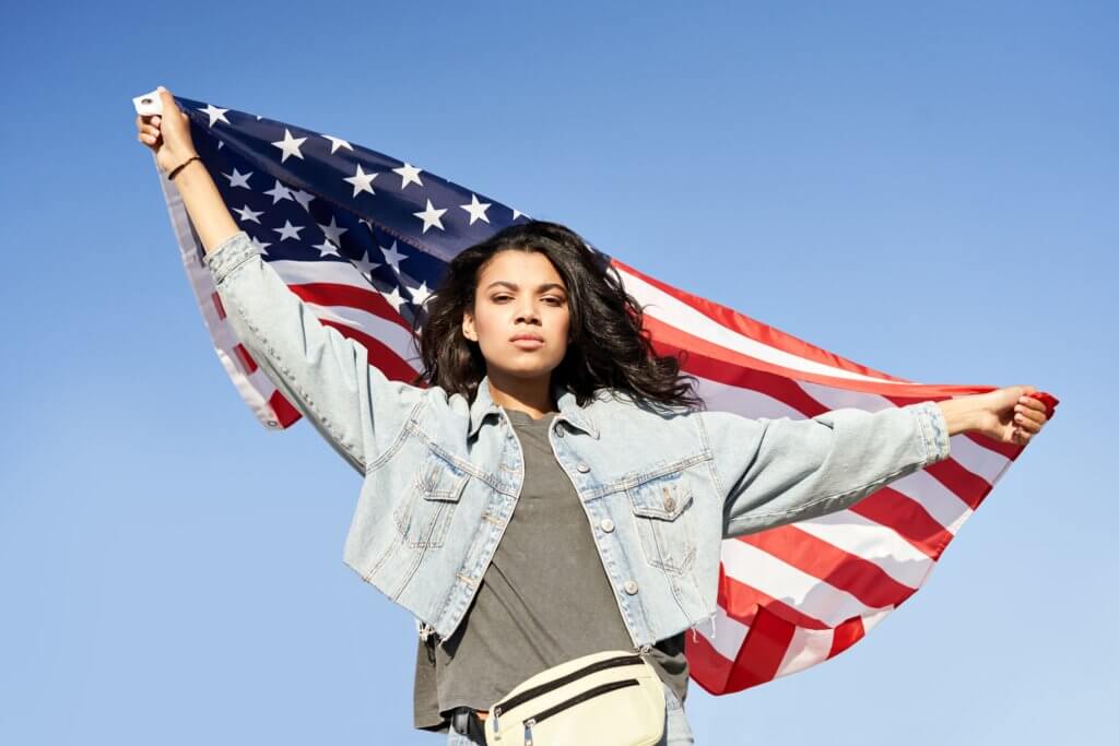 Woman holding the U.S. flag